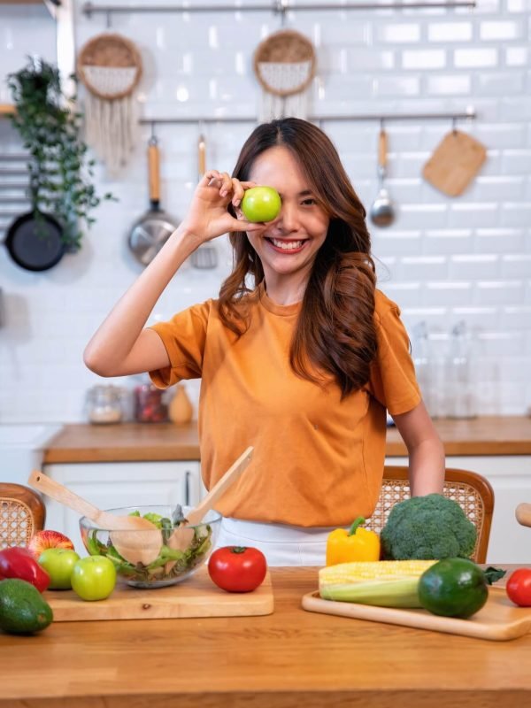 beautiful-young-woman-happy-portrait-cooking-fresh-organic-clean-food-fruit-at-home-modern-kitchen-3.jpg